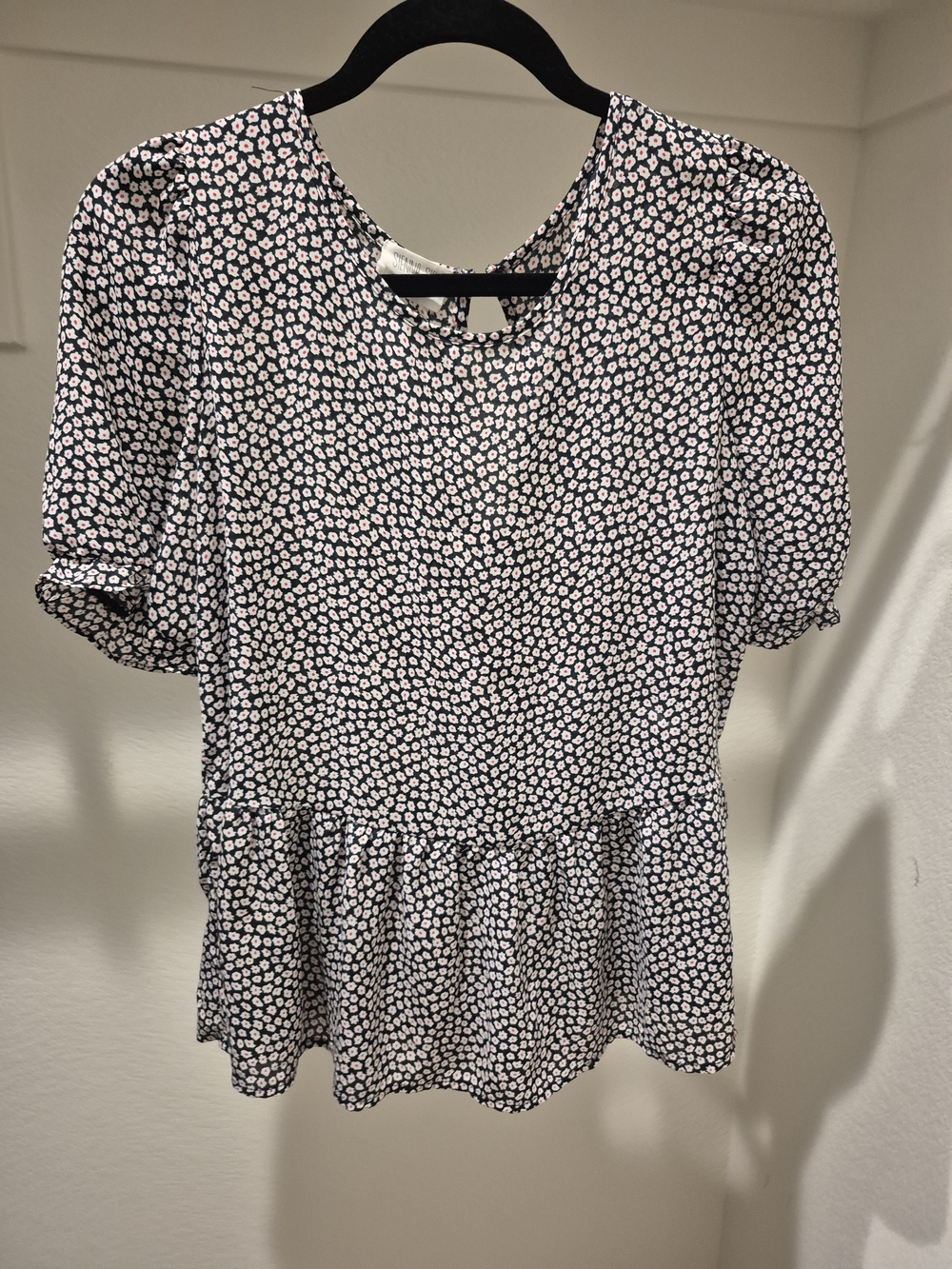 Sienna Sky Navy and White Ditsy Floral Peplum Blouse